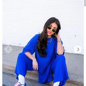 Dressed in LALA Lex ribbed playsuit new size medium royal blue